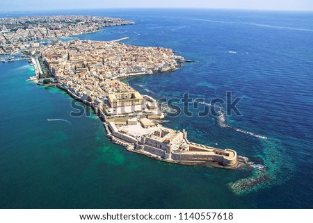Coastline town Syracuse Sicily and old Ortigia island Royalty-Free Stock Photo #1140557618