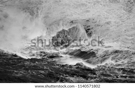 tribute to Ansel Adams,artistic black and white photography of breaking wave, 