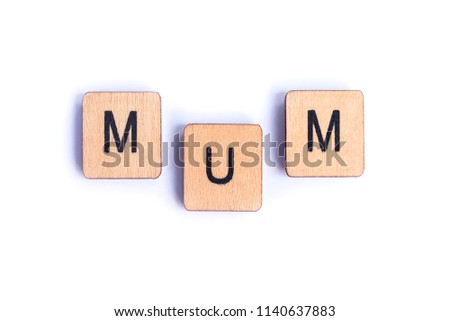 The word MUM spelt with wooden letter tiles.