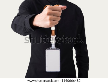 employee hand showing blank id name card badge holder for mockup template logo branding background.