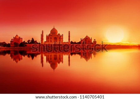  view of Taj Mahal during sunset reflected in the Yamuna river, in Agra , Uttar Pradesh, India Royalty-Free Stock Photo #1140705401