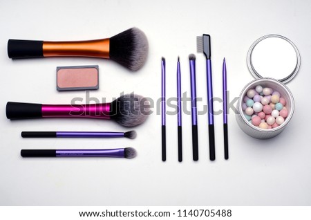 Pattern of make-up kit: brushes, meteorite powder and blusher Royalty-Free Stock Photo #1140705488