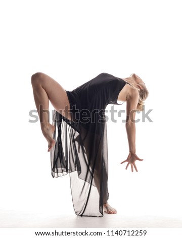 Beuatiful female dancer. White background