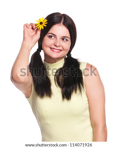 The young woman smartens up with camomile isolated over white