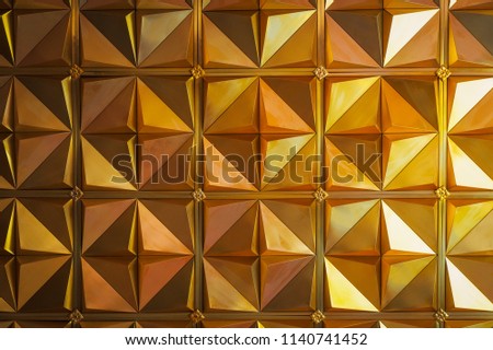 Golden triangle background or texture. Abstract architectural pattern