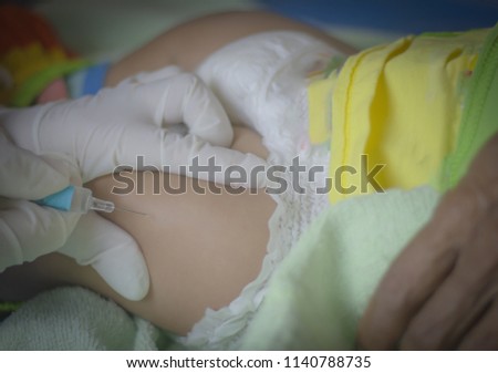 Blurred pictures of nurses, vaccinations, their first child was born in hospital.