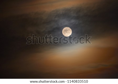 Halo and Clouds around Super Full Moon on Dark Sky, Sci-Fi Fantasy Dramatic Horror Background 