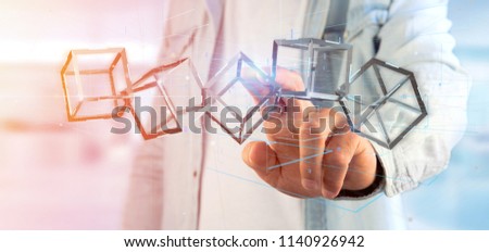 View of a Man holding a 3d rendering blockchain cube isolated on a background