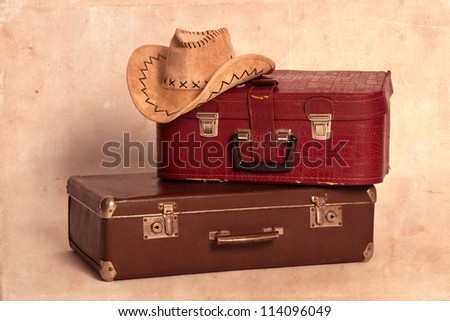 Cowboy hat and suitcases