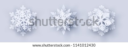 Vector set of 3 white Christmas paper cut 3d snowflakes with shadow on white background. New year and Christmas design elements