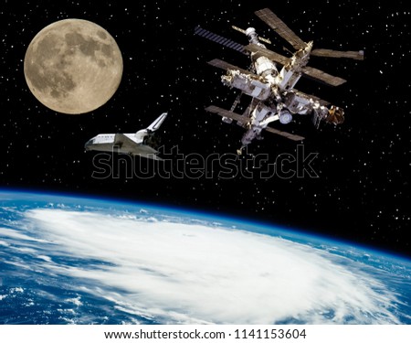 Shuttle goes from earth to moon. The elements of this image furnished by NASA.
