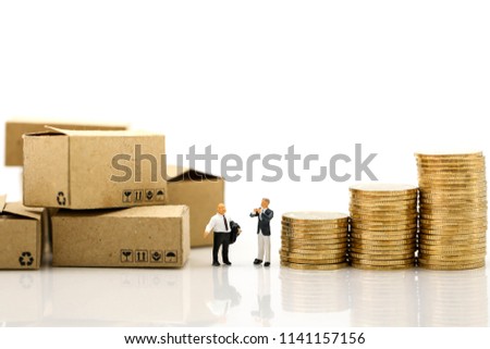 Miniature people : Businessman and Worker and box with stack of coins shipping, rent container, business concept.