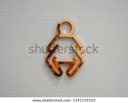 Baby changing diapers flat icon sign made of copper on white background