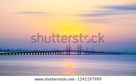 Morning view of penang bridge 1 , sunrise at Penang Island, Travel Malaysia , waterside view landscape, Industrial city Royalty-Free Stock Photo #1141197989
