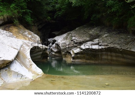 Geological site of Brent de l'Art: canyons carved into the rock by the river Ardo, in Valbelluna, Belluno, Italy. Royalty-Free Stock Photo #1141200872
