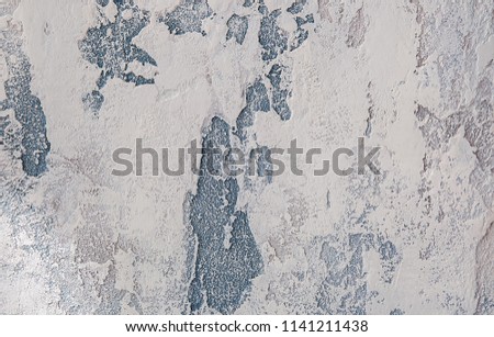 Photo of abstract plaster background with layers of different forms of textural