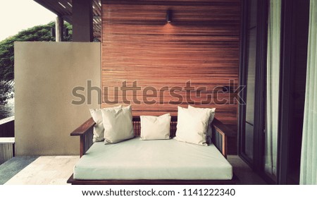 wooden seats and pillows
