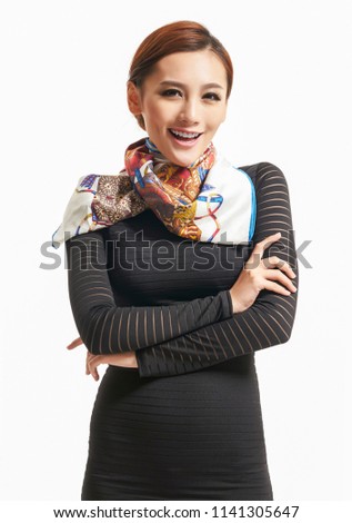 Laughing Asian beauty showing white teeth