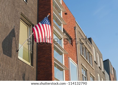 american flag hanging outside during July 4th in Enschede, Netherlands
