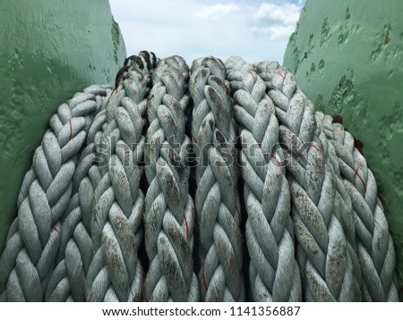 The roll of large rope cable in the ferry boat