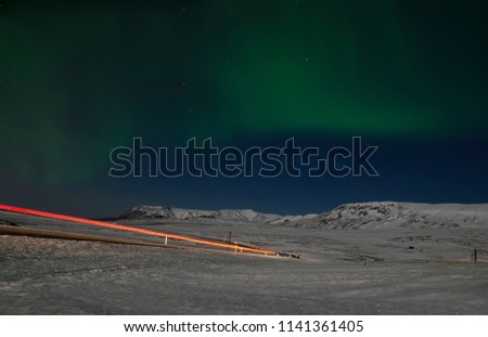 Aurora in  Night Sky. Iceland. Snow