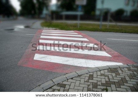 Danger street pedestrian crosswalk with red color