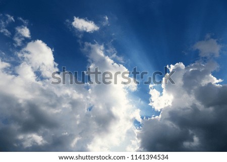 Sun rays bursting through the clouds