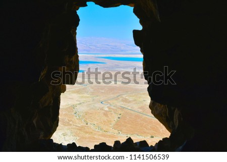 like a window to the world in Masada Israel landscape picture with the dead sea on the background