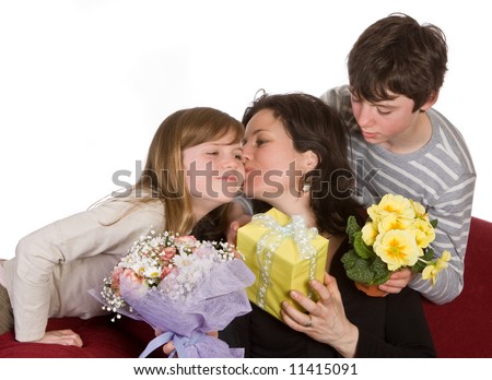 Mother kissing her daughter on mother's day Royalty-Free Stock Photo #11415091
