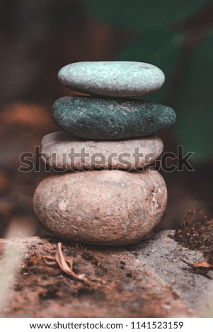 Stack of stones on a wall. Concept of balance and harmony