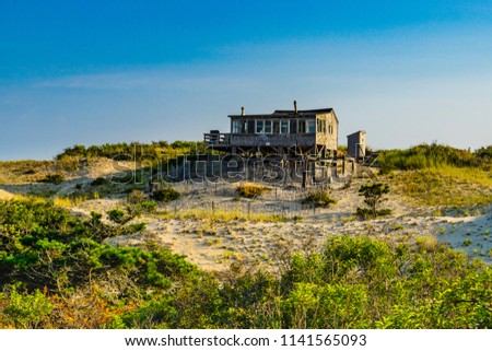 Sand Dunes, house and Grass of the Provincelands Cape Cod MA US.