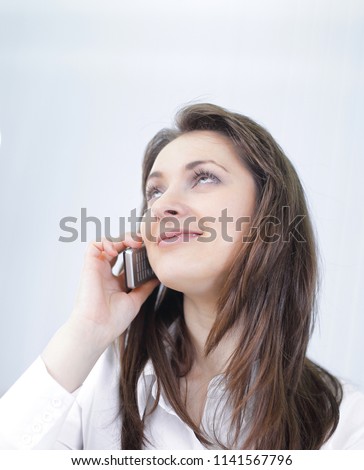 Executive business woman talking on mobile phone