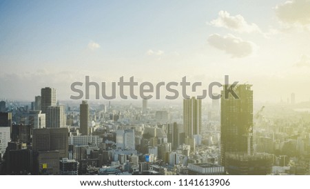 Business idea for real estate - Top view over the beautiful tall buildings of Osaka City in Japan.