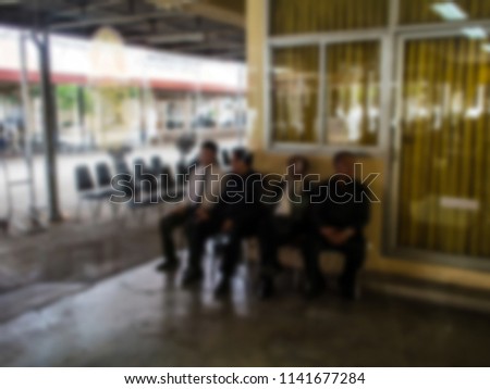 The atmosphere in the funeral at the temple, many people are sad. Abstract image blur