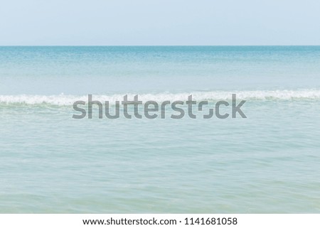 Calm blue sea with waves seen nature background