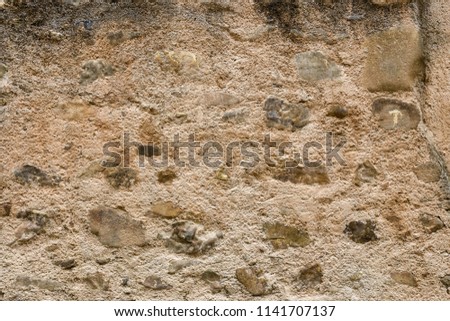 Texture of a stone wall as background