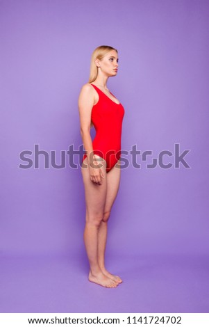 Half turned full size photo portrait of beautiful pretty attractive strict serious lady standing straight isolated vivid bright background