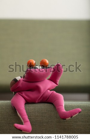 sitting frog doll