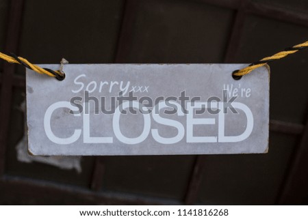 Closed sign in a shop window