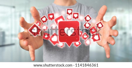 View of a Businessman holding Like notification on a social media 3d rendering