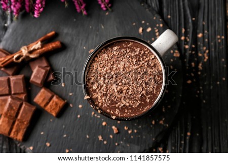 Cup of hot chocolate on slate plate