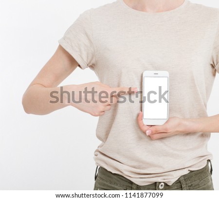 Girl holding white phone. Cellphone isolated on white clipping path inside. Online shopping. Top view.Mock up.Copy space.Template.Blank.
