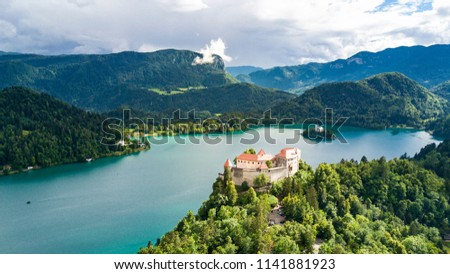 Aerial view of Lake Bled and the castle of Bled. Aerial FPV drone photography. Slovenia, Europe