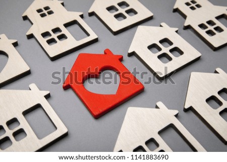 Search and selection of homes for purchase or rent. Many house models and one red with heart