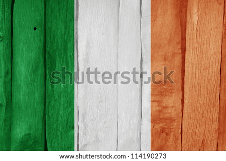 Wooden fence with the flag of Ireland painted on it