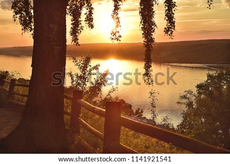 View of the sunset on the river. Landscape.