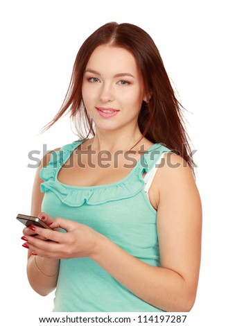 Portrait of beautiful young female using cellphone, isolated on white background