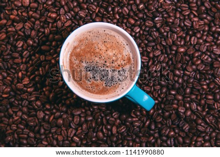Cup of coffee. Coffee bean. Love to drink coffee. The composition laid out of coffee bean. Concept