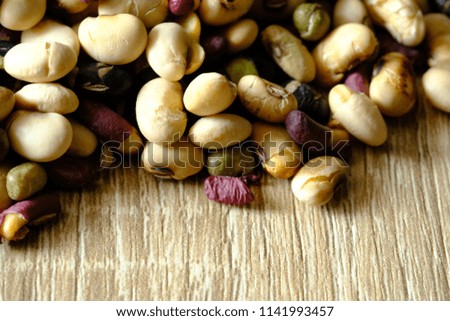 Peanut, Soybean, Black Bean close-up on wood background