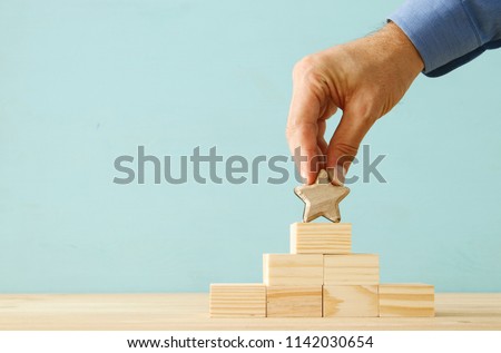 concept image of setting a one star goal. increase rating or ranking, evaluation and classification idea Royalty-Free Stock Photo #1142030654